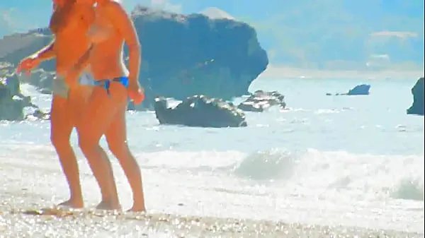 Stort Beach Spy boobs close up varmt rør
