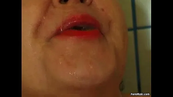 Big Chubby granny pissing in the shower warm Tube