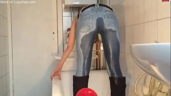 Big Cute girl piss in her jeans warm Tube