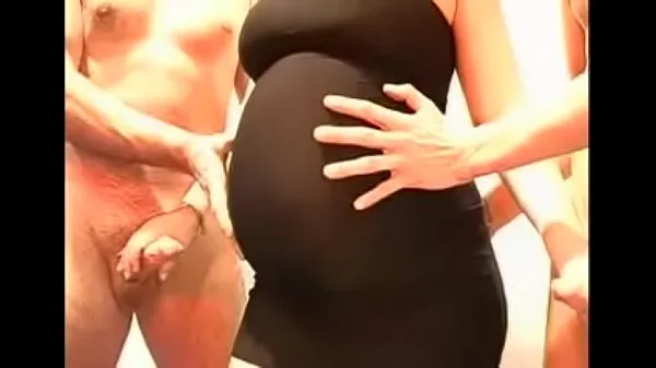 Stort Pregnant in black dress gangbang varmt rør