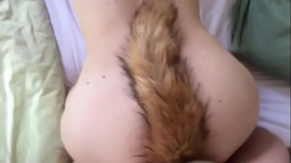 Grote Having sex with fox tails in both warme buis