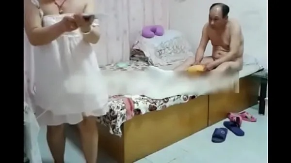 Big Chinese woman and her guy at the hotel warm Tube