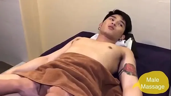 Stort cute Asian boy ball massage varmt rør