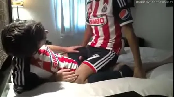 Big Mexican soccer players warm Tube