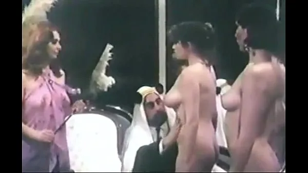 Stort arab sultan selecting harem slave varmt rør
