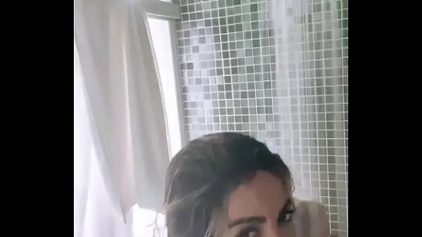 Big Anitta leaks breasts while taking a shower warm Tube