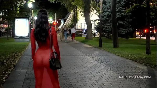 Red transparent dress in public Tabung hangat yang besar