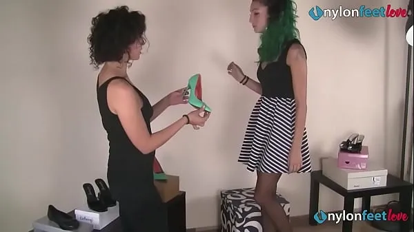 Ống ấm áp Lesbians have footfetish fun in a shoe store wearing nylons lớn
