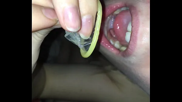Big swallowing cum from a condom warm Tube