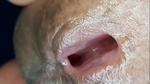 Stort Zoom in on the urethra of the gososo penis varmt rør