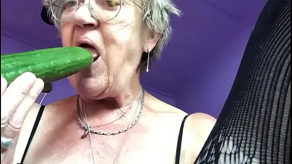 Big Grandma plays with cucumber warm Tube
