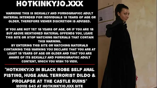 Grote Hotkinkyjo in black robe self anal fisting, huge anal terrorist dildo & prolapse at the castle ruins warme buis